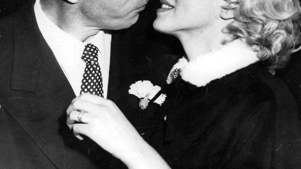 T,V, and Films, 16th January 1954, San Francisco, USA, Legendary Hollywood Film actress Marilyn Monroe prepares to kiss her husband former US Baseball player Joe DiMaggio after their wedding