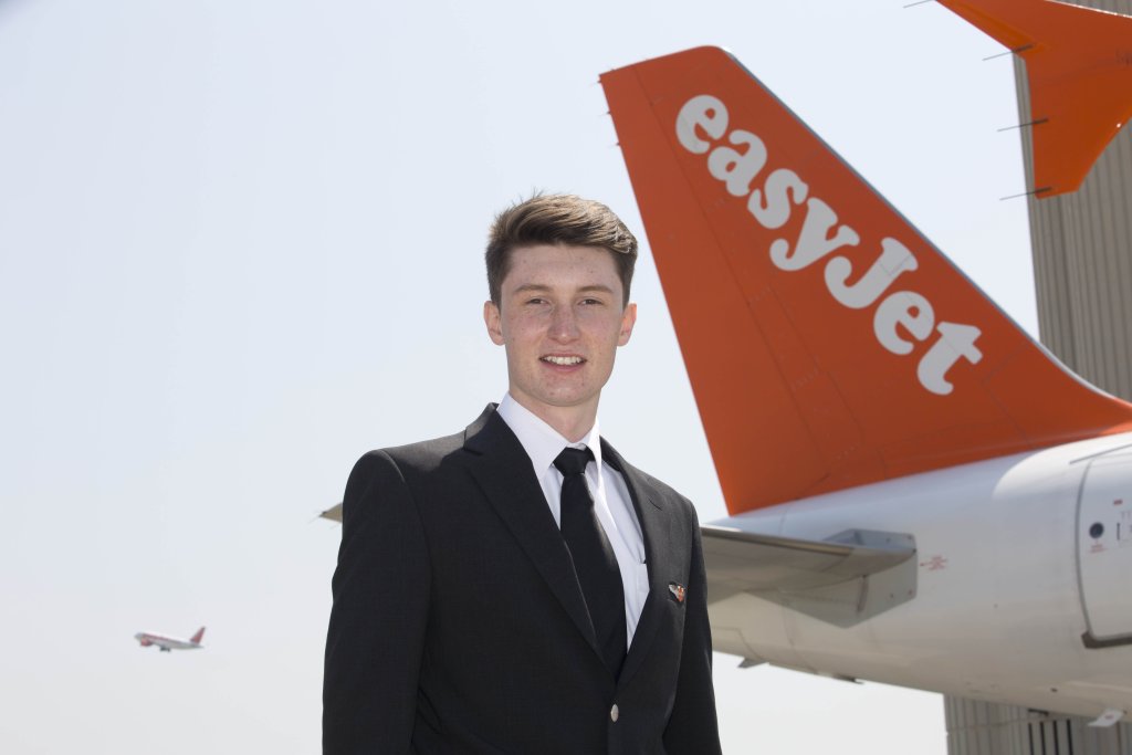 EASYJET'S YOUNGEST PILOT- FIRST OFFICER LUKE ELSWORTH  WITH HIS FATHER EASYJET PILOT CAPTAIN PAUL ELSWORTH AT GATWICK AIRPORT.