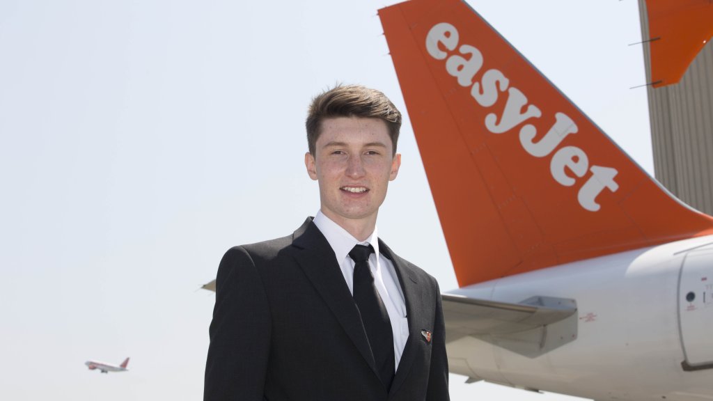 EASYJET'S YOUNGEST PILOT- FIRST OFFICER LUKE ELSWORTH  WITH HIS FATHER EASYJET PILOT CAPTAIN PAUL ELSWORTH AT GATWICK AIRPORT.