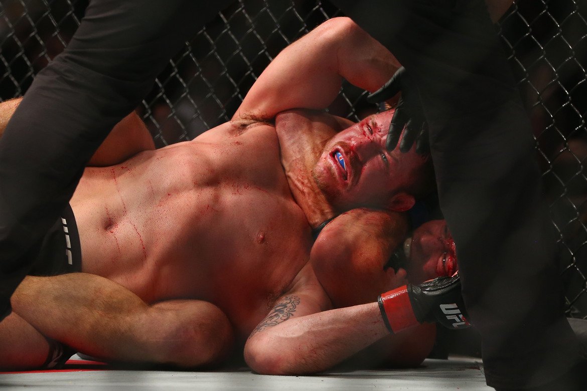 Rear naked choke and THE NEW UFC middleweight champion is...