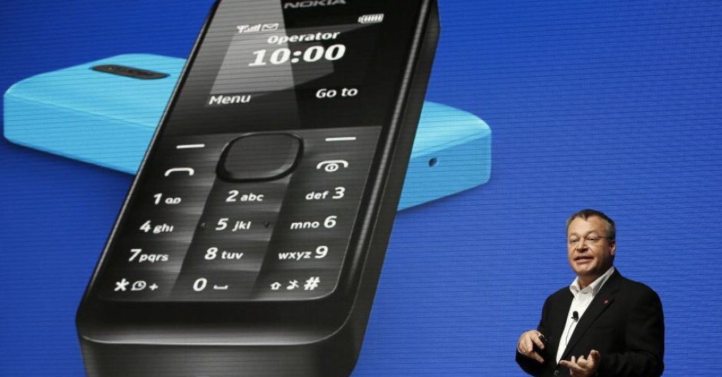 Nokia Chief Executive Stephen Elop gestures during a presentation at the Mobile World Congress in Barcelona