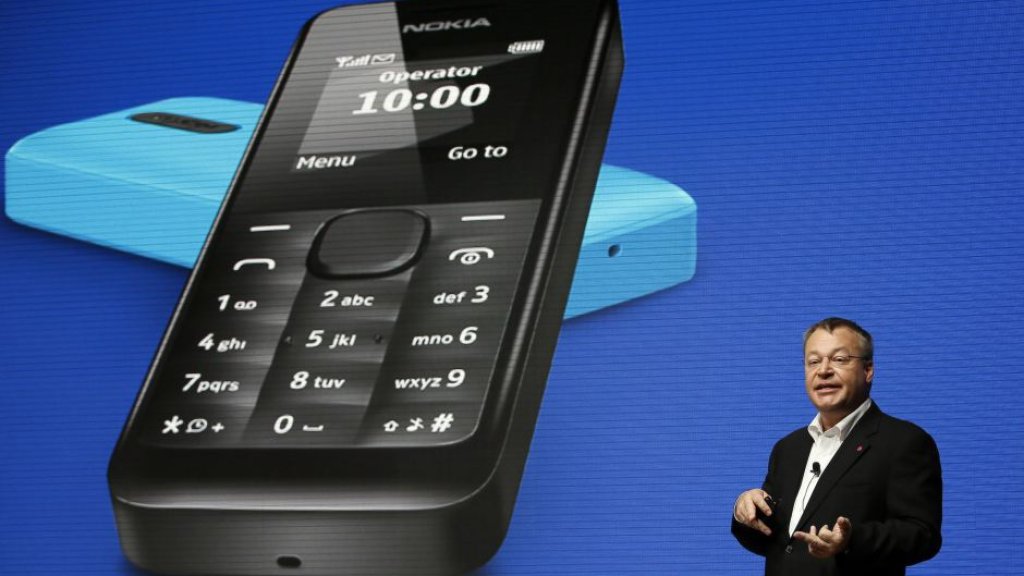 Nokia Chief Executive Stephen Elop gestures during a presentation at the Mobile World Congress in Barcelona