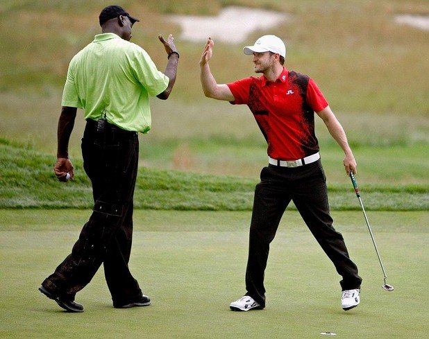 С Майкъл Джордан на голф турнир.