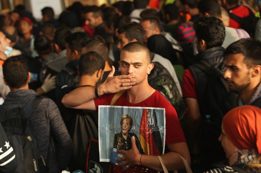 Migrants Arrive In Germany Following Ordeal In Hungary