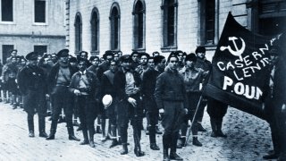 POUM militia guards the Headquarters of the POUM in Barcelona.