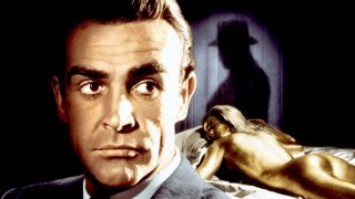 "Голдфингър" (Goldfinger, 1964)
Бонд е: Шон Конъри
Ваканцията на Агент 007 след успешна мисия бързо се превръща в поредната задача, когато му се налага да разследва магната Орик Голдфингър и конспирация около мащабен контрабанден износ на злато. 
"Голдфингър" е третият от поредицата и най-успешният до онзи момент, не само заради по-големия си бюджет. Това е филмът, в който създателите на Бонд сякаш откриват успешната формула за героя и много от характерните неща, които правят поредицата успешна - от хумора, включително в имената на персонажите, до технологичните джаджи, които шпионинът използва. Очаква ви и една от най-култовите реплики за цялата поредица:
- Очакваш да говоря ли?
- Не, г-н Бонд. Очаквам да умрете.