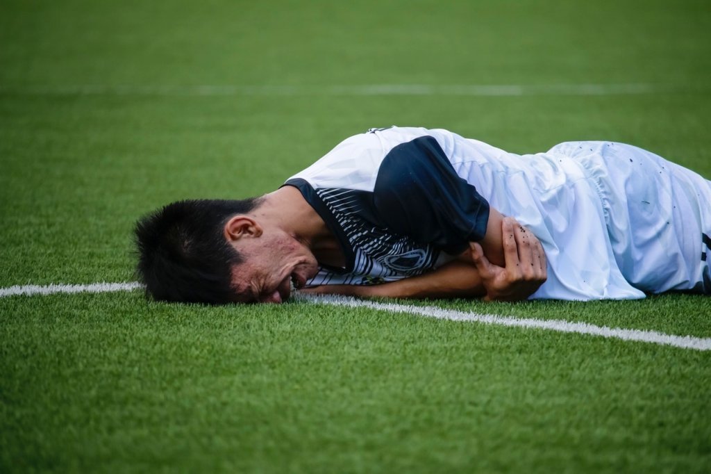 athlete-game-grass-1277396
