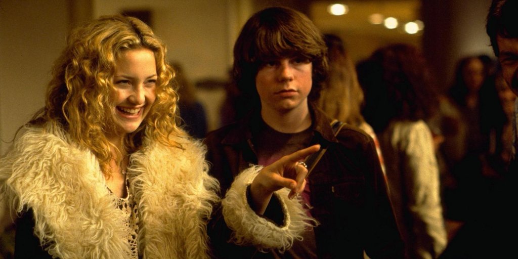 "ALMOST FAMOUS" 
2000 
Мечтата за всяко 15-годишно хлапе - да отиде на турне с рокендрол банда. Тази къдрава  сладуранка е Кейт Хъдсън. 