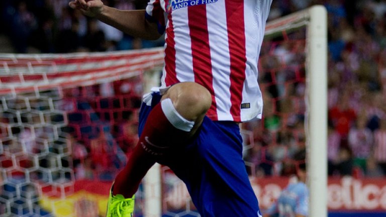 Капитанът Диего Годин се разписа при 5:0 на Атлетико над Малмьо в Мадрид.