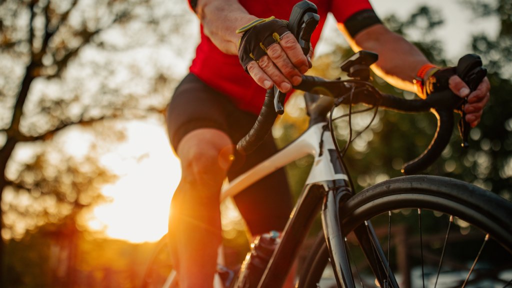 Close up of man riding bike