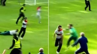 Хаос на тренировката на Португалия, фен награби Роналдо (видео)