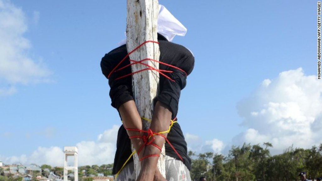 140327025443-somalia-execution-adan-sheikh-abdi-story-top