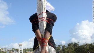140327025443-somalia-execution-adan-sheikh-abdi-story-top
