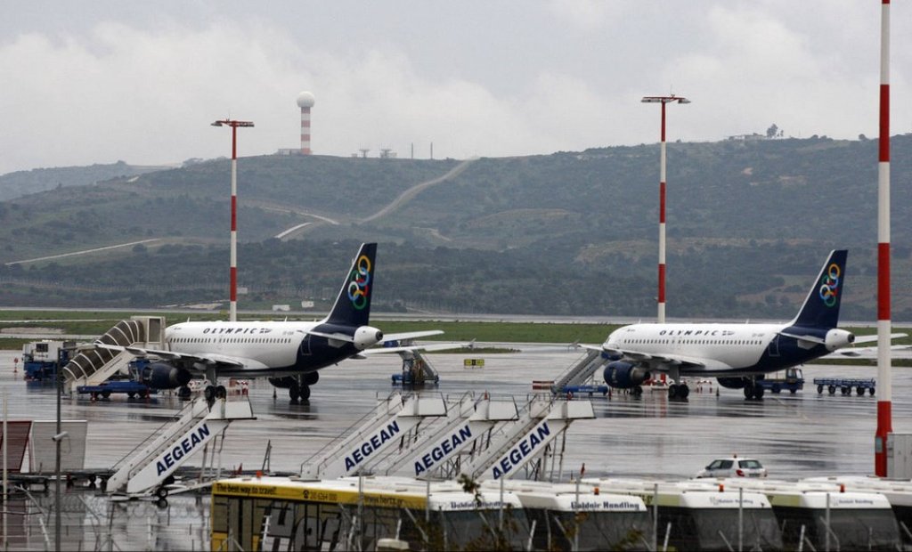 Aegean_Olympic jetliners on the tarmac at Athens International Airport