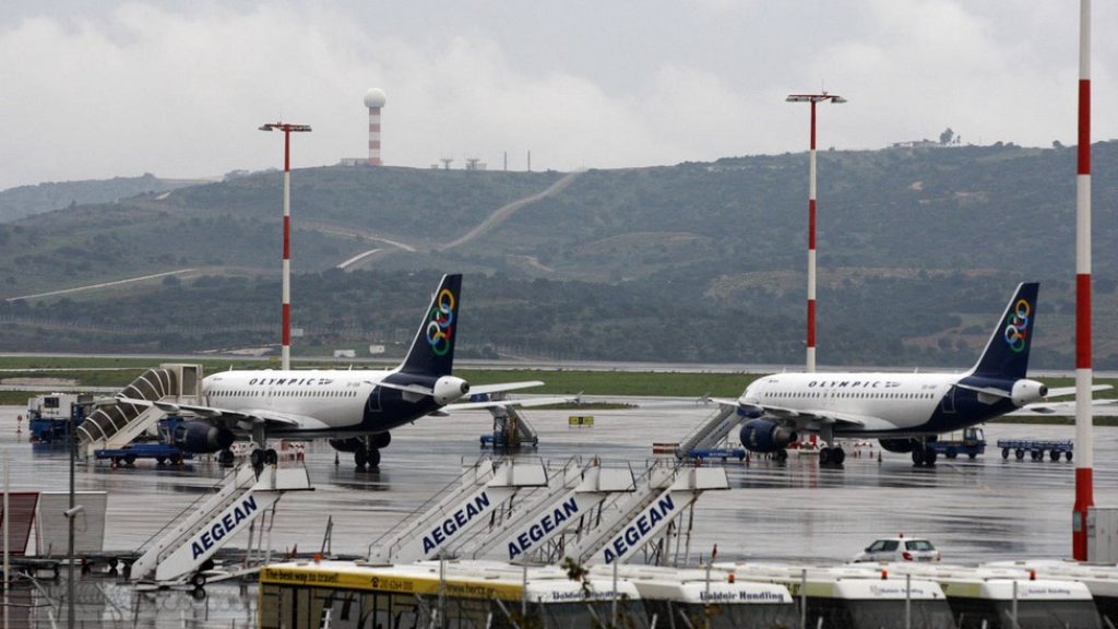 Aegean_Olympic jetliners on the tarmac at Athens International Airport