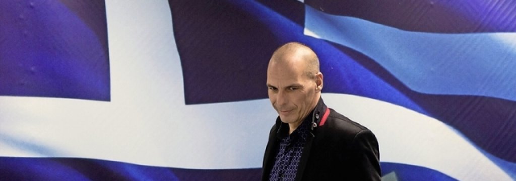 Newly appointed Greek Finance Minister Yanis Varoufakis arrives at a hand over ceremony in Athens