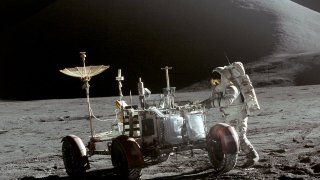 1280px-Apollo_15_Lunar_Rover_and_Irwin