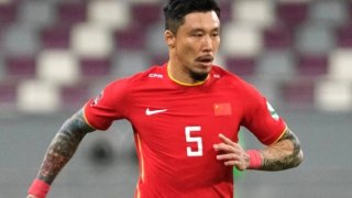 Джан Линпен е един от националите, които са били карани да прикриват татуировките си