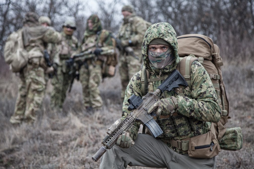 Portrait of army elite tactical group fighter