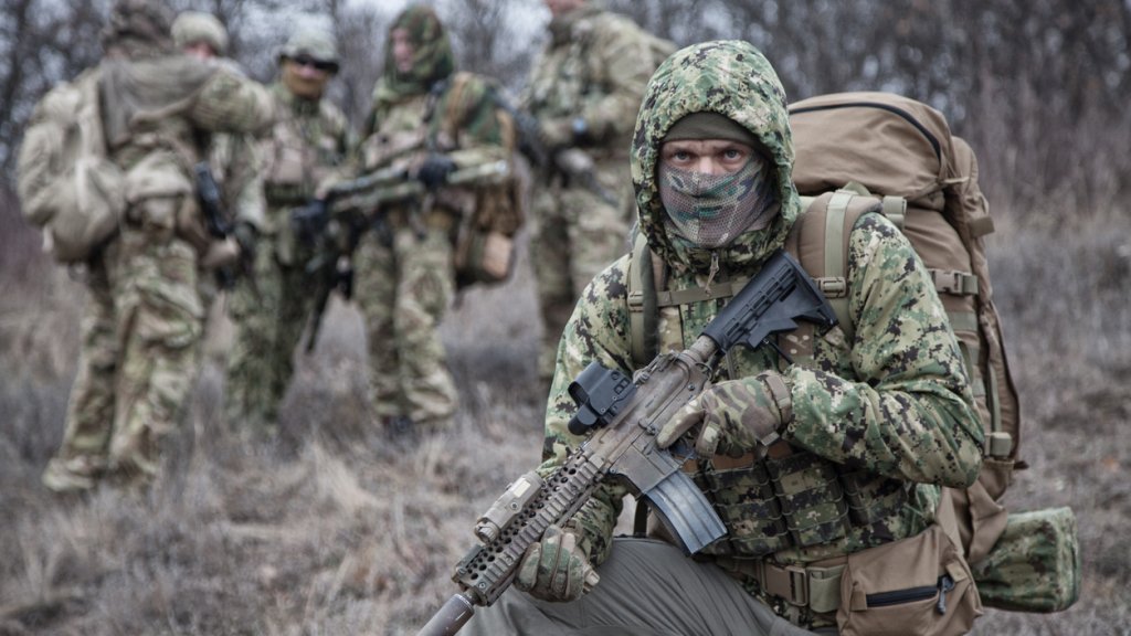 Portrait of army elite tactical group fighter