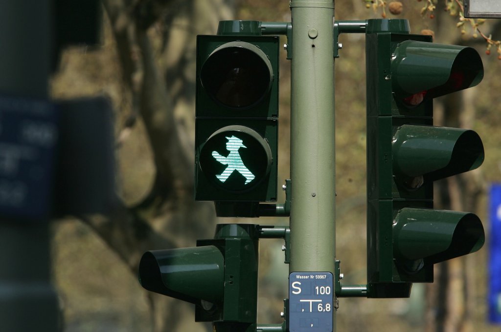 Legal Battle Emerges Over Stoplight Pedestrian Figure