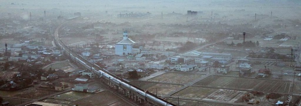 The first train of the new Hokuriku shinkansen or bullet train, bound for Tokyo, runs near Shin-Takaoka Station in Takaoka, Toyama prefecture