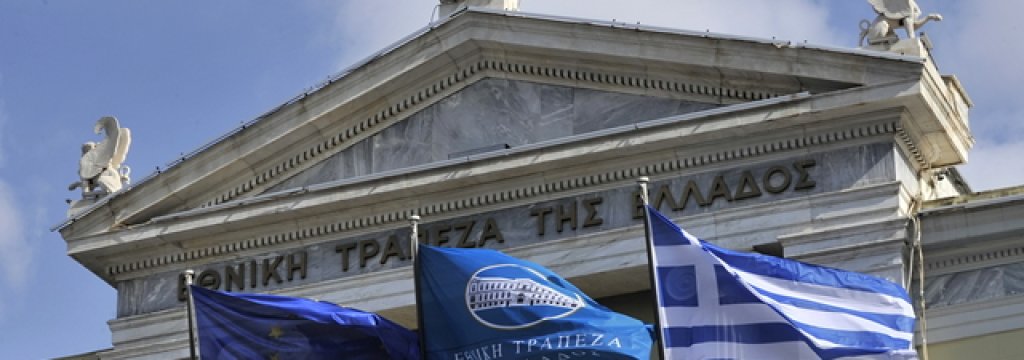 EU, banks' and Greek flags flutter at th