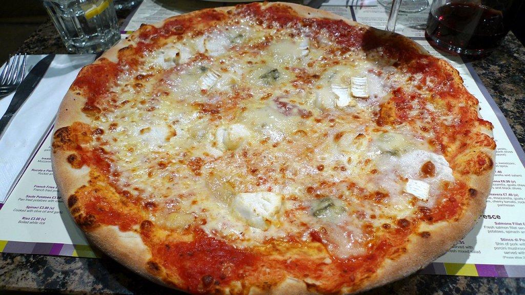 Pizza_quattro_formaggi_at_restaurant,_Chalk_Farm_Road,_London