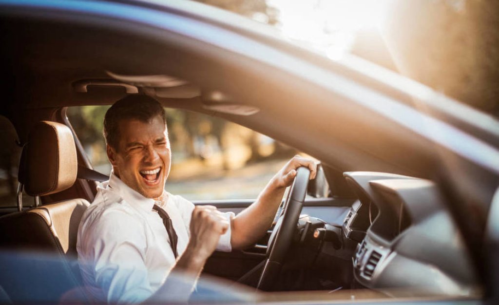 close-up-photo-of-a-businessman-driving-a-car