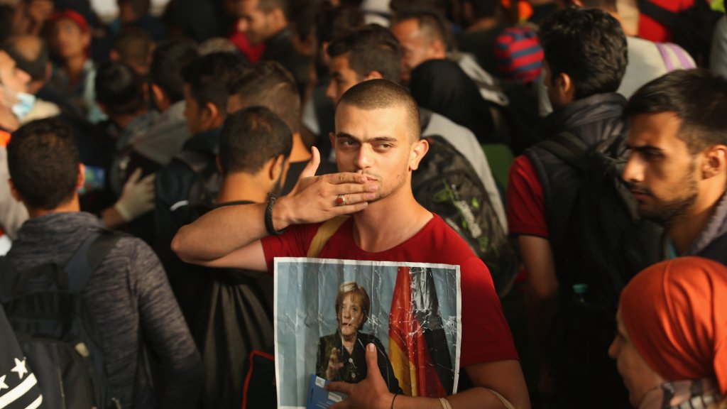 Migrants Arrive In Germany Following Ordeal In Hungary