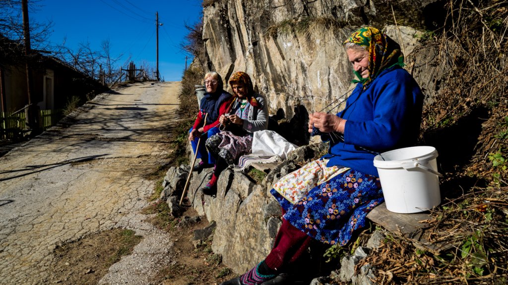 Pomaks making crochet while sunbathing
