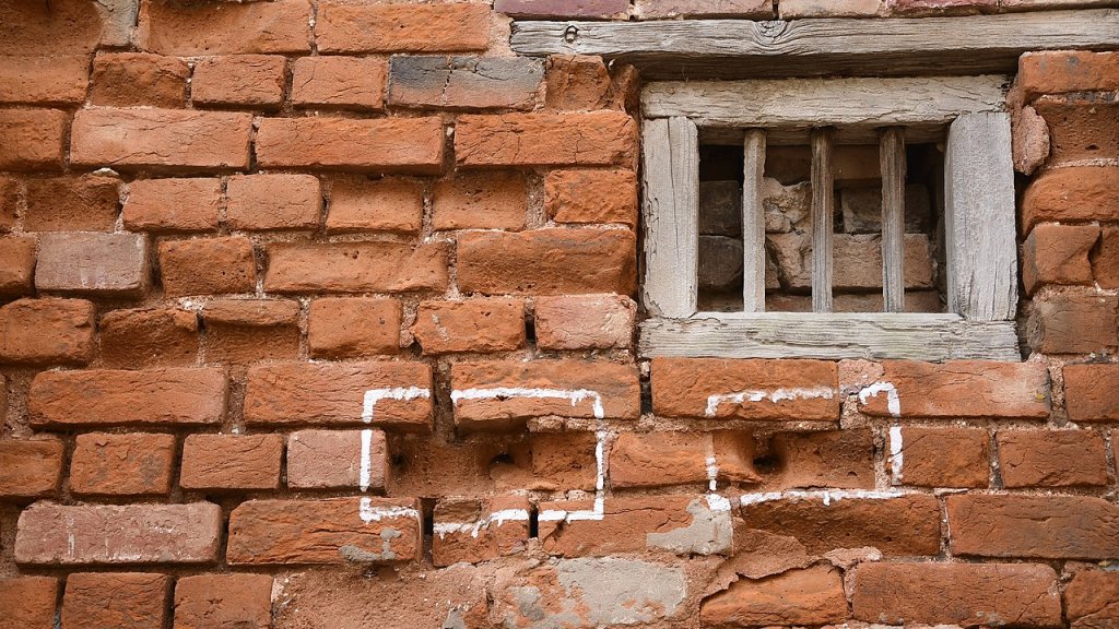 1280px-Bullet_marks_at_Jallianwala_Bagh