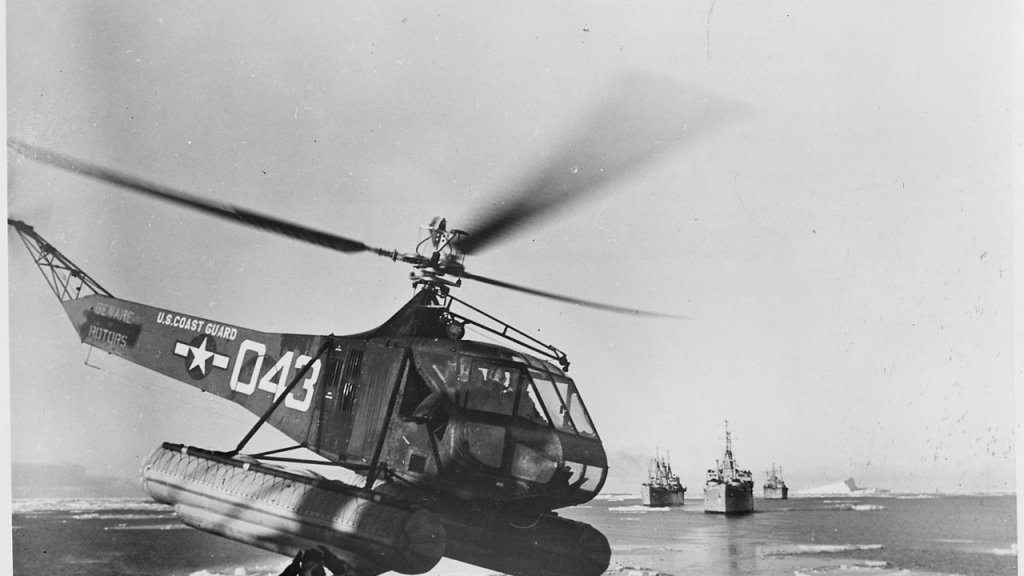 1280px-US_Navy_Antarctic_Expedition_Helicopter_returns_from_survey_of_South_Pole_waters._The_Coast_Guard_helicopter_is_shown..._-_NARA_-_196475