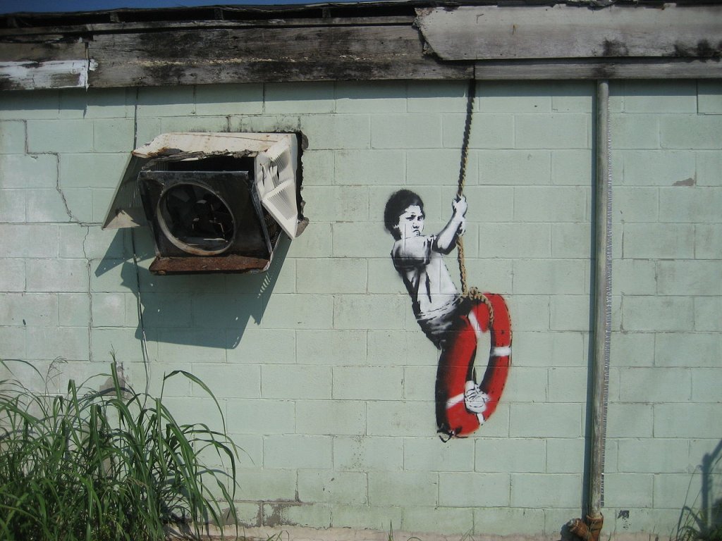1280px-Banksy_Swinger_Building_Detail