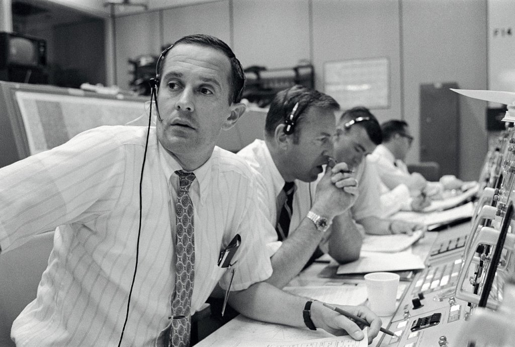 Duke,_Lovell_and_Haise_at_the_Apollo_11_Capcom,_Johnson_Space_Center,_Houston,_Texas_-_19690720