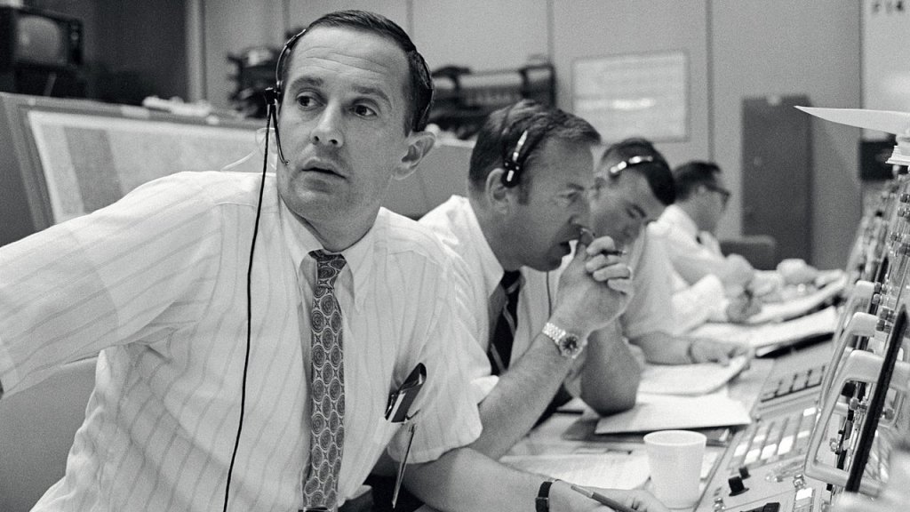 Duke,_Lovell_and_Haise_at_the_Apollo_11_Capcom,_Johnson_Space_Center,_Houston,_Texas_-_19690720