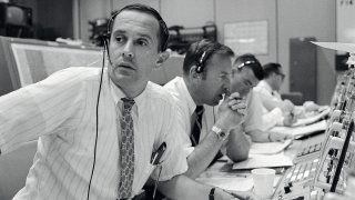 Duke,_Lovell_and_Haise_at_the_Apollo_11_Capcom,_Johnson_Space_Center,_Houston,_Texas_-_19690720