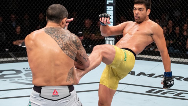 Лиото Мачида нокаутира Витор Белфорд с впечатляващ фронт кик малко преди края на втория рунд – повторение на това, което направи срещу Ранди Котур преди няколко години.