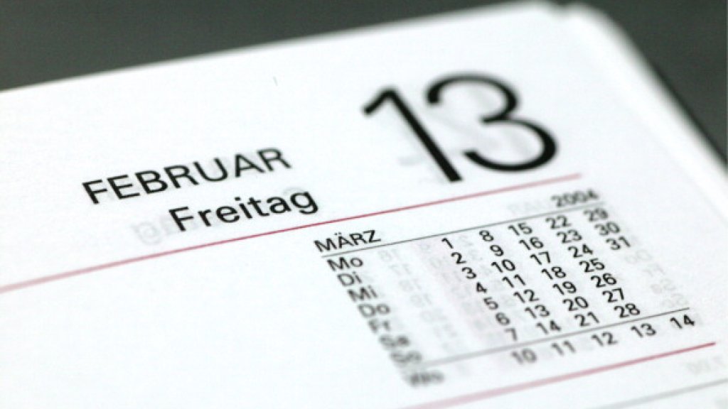 Symbolic picture: Friday the 13th ( bad luck, bad luck day, superstition ), Page of a calendar with Friday the 13th.