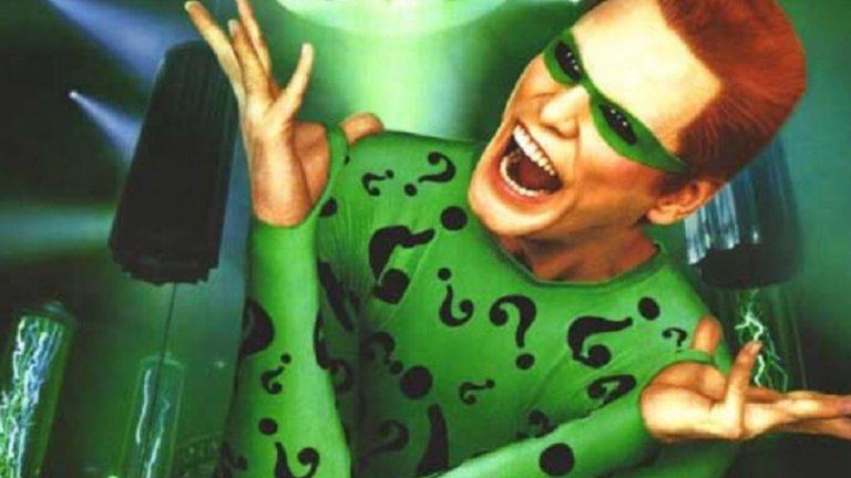 Batman Forever / Батман Завинаги
Вторият опит на актьора във филмите по комикси има едновременно добри и лоши страни. Кери поема ролята на Едуард Нигма/The Riddler в горе-долу приемливата екранизация "Батман завинаги" на Джоел Шумахер от 1995-а (онзи с Вал Килмър). Неговият персонаж е смахнат учен (каква изненада...), чиито идеи биват отхвърлени от всички и той решава да ги приложи насила, като между другото убива няколко души.
Актьорът, в типично свой стил, подхожда по-комедийно и дори леко лигаво към ролята. И то до такава степен, че неговият Riddler изглежда по-скоро като версия на Жокера. Въпреки това Джим Кери определено е сред по-забавните неща в "Батман завинаги".