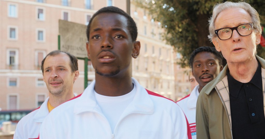 The Beautiful Game (2024)
Сюжетът на този трогателен филм ни среща с Мал (Бил Найти) – мениджър на английския футболен отбор за бездомни, който отвежда играчите си в Рим с надеждата да триумфират на Световното първенство за бездомни хора. 
В последния момент той решава да включи в състава Вини (Майкъл Уорд) – изключително талантлив нападател, който може да донесе на тима реална победа. За да се случи това обаче, Вини първо трябва да остави миналото си зад гърба и да се научи да бъде част от отбора.