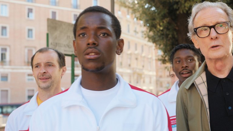 The Beautiful Game (2024)
Сюжетът на този трогателен филм ни среща с Мал (Бил Найти) – мениджър на английския футболен отбор за бездомни, който отвежда играчите си в Рим с надеждата да триумфират на Световното първенство за бездомни хора. 
В последния момент той решава да включи в състава Вини (Майкъл Уорд) – изключително талантлив нападател, който може да донесе на тима реална победа. За да се случи това обаче, Вини първо трябва да остави миналото си зад гърба и да се научи да бъде част от отбора.
