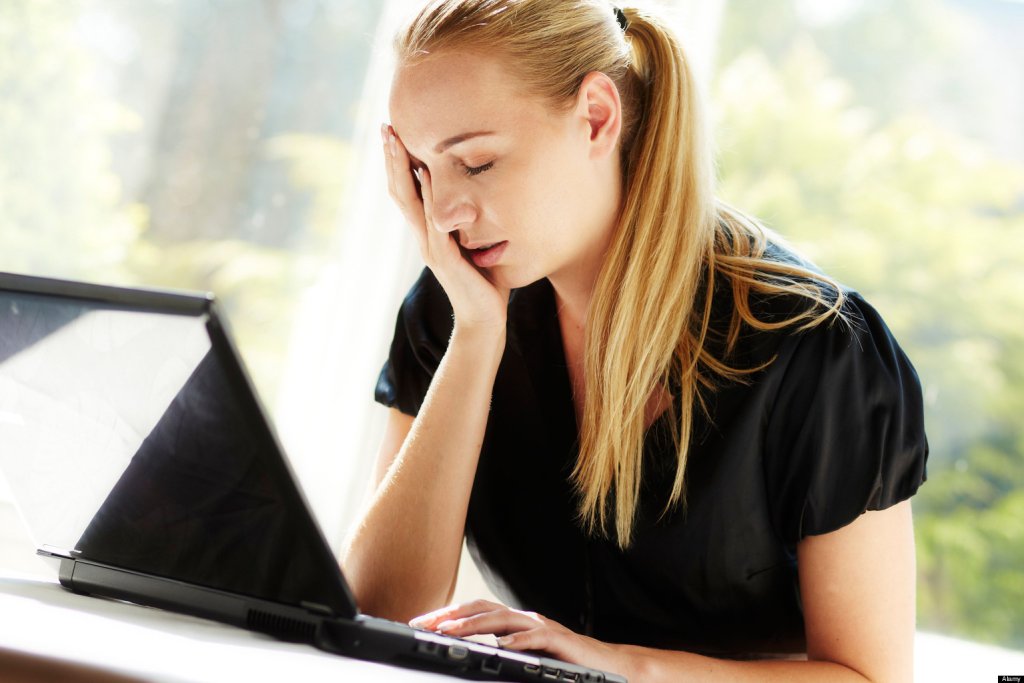 Stressed woman in office