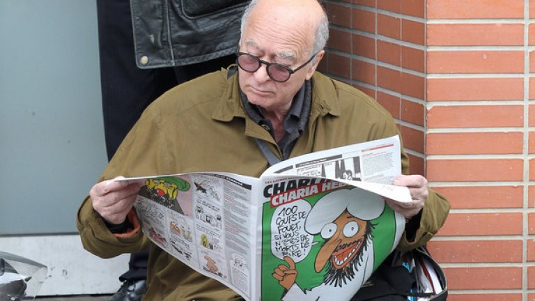 Френският каракатурист Джордж Волински, чете броя на сатиричното издание Charlie Hebdo, на стълбите пред нюзрума му, малко след бомбен атентат срещу него през 2011 година. На първа страница се вижда корицата, с с карикатура на Мохамед, станала причина за терористичния акт
 Той е след убитите