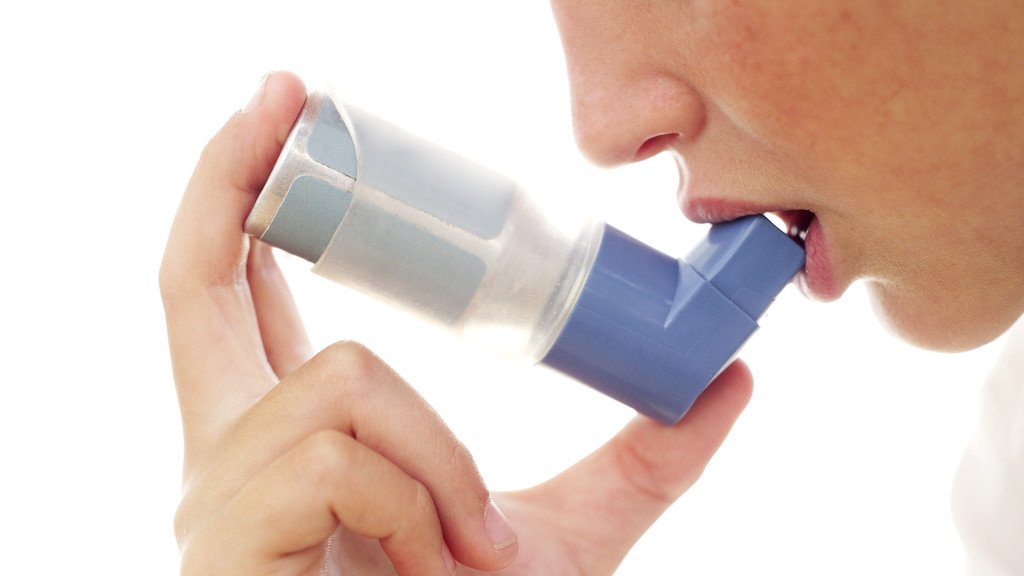 Person Using an Inhaler