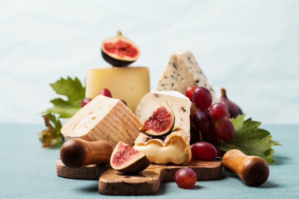 Variety of cheeses on serving board