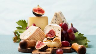 Variety of cheeses on serving board