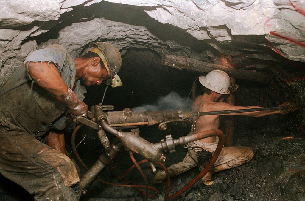 Miners Digging for Gold