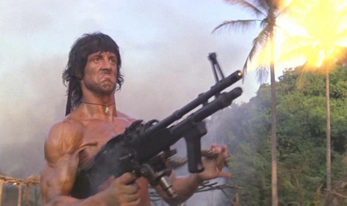 "Рамбо: Първа кръв II" (Rambo: First Blood II, 1985 г.)

След като за ветерана от Виетнам собствената родина е била врагът в първия филм, време е гневът и уменията му да бъдат насочени към СССР. Джон Рамбо (Силвестър Сталоун) е освободен от затвора и върнат отново във Виетнам в търсене на военнопленици. Естествено, намира още по-големи неприятности. Трябва да се отбележи, че тук не само комунистите (представени от садистичния полковник Подовски и неговия бияч сержант Юшин) са лошите, но в някаква степен и американското правителство, което Рамбо продължава да вини за своето положение и това на други ветерани. Във всички случаи обаче, ако човек реши да гледа филм за Рамбо, е най-добре да се ограничи само до първия.
