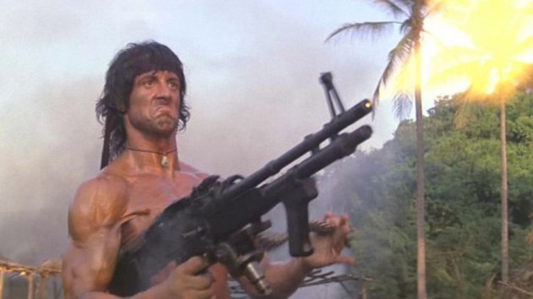 "Рамбо: Първа кръв II" (Rambo: First Blood II, 1985 г.)
След като за ветерана от Виетнам собствената родина е била врагът в първия филм, време е гневът и уменията му да бъдат насочени към СССР. Джон Рамбо (Силвестър Сталоун) е освободен от затвора и върнат отново във Виетнам в търсене на военнопленици. Естествено, намира още по-големи неприятности. Трябва да се отбележи, че тук не само комунистите (представени от садистичния полковник Подовски и неговия бияч сержант Юшин) са лошите, но в някаква степен и американското правителство, което Рамбо продължава да вини за своето положение и това на други ветерани. Във всички случаи обаче, ако човек реши да гледа филм за Рамбо, е най-добре да се ограничи само до първия.